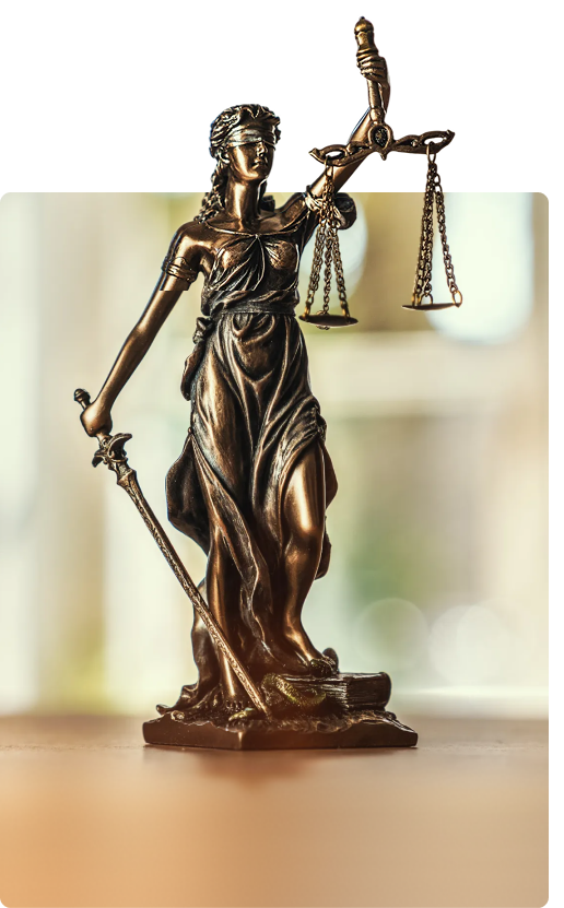 Bronze statue of Lady Justice holding scales and a sword